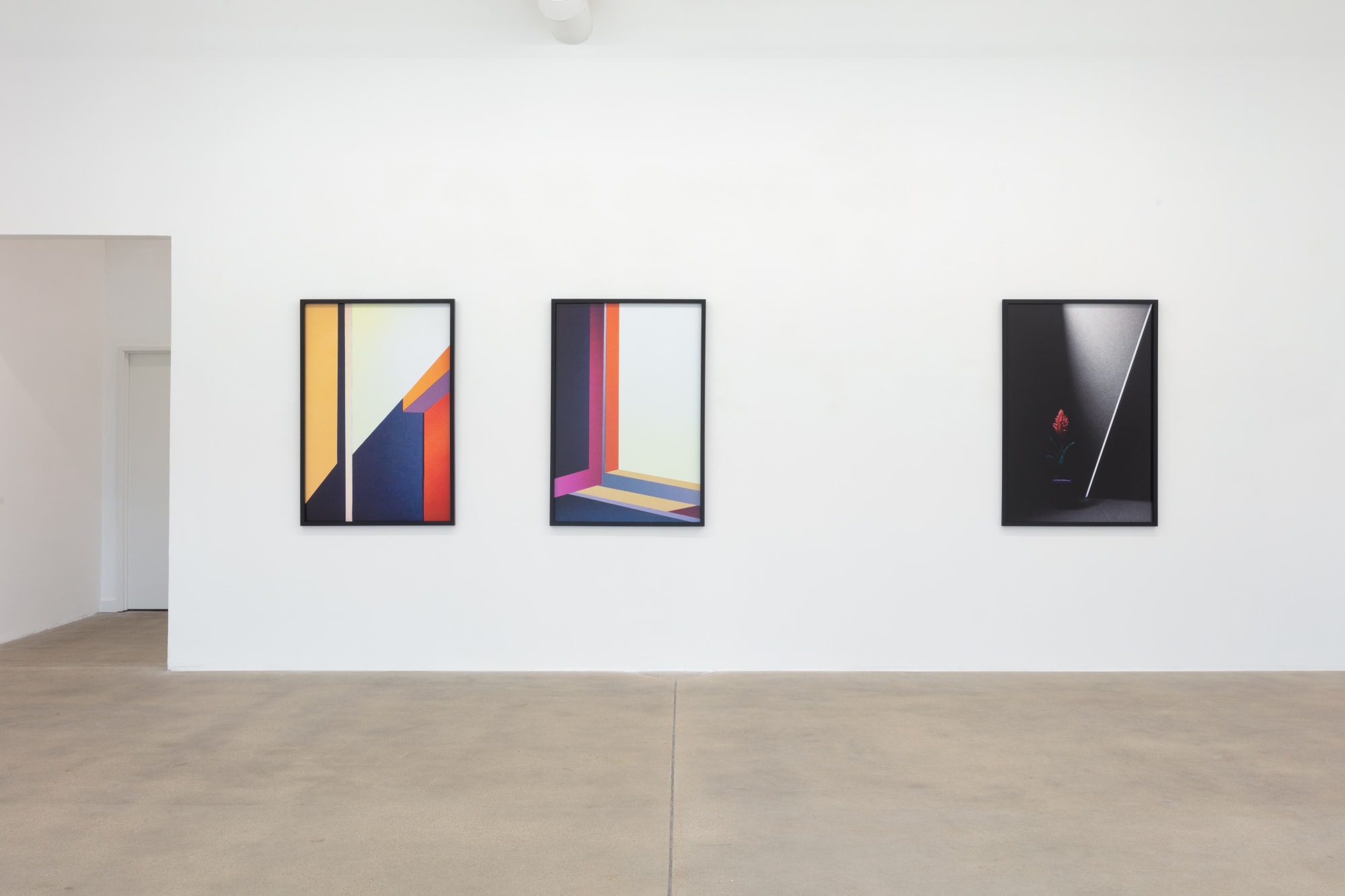 installation view of photographs by Popel Coumou