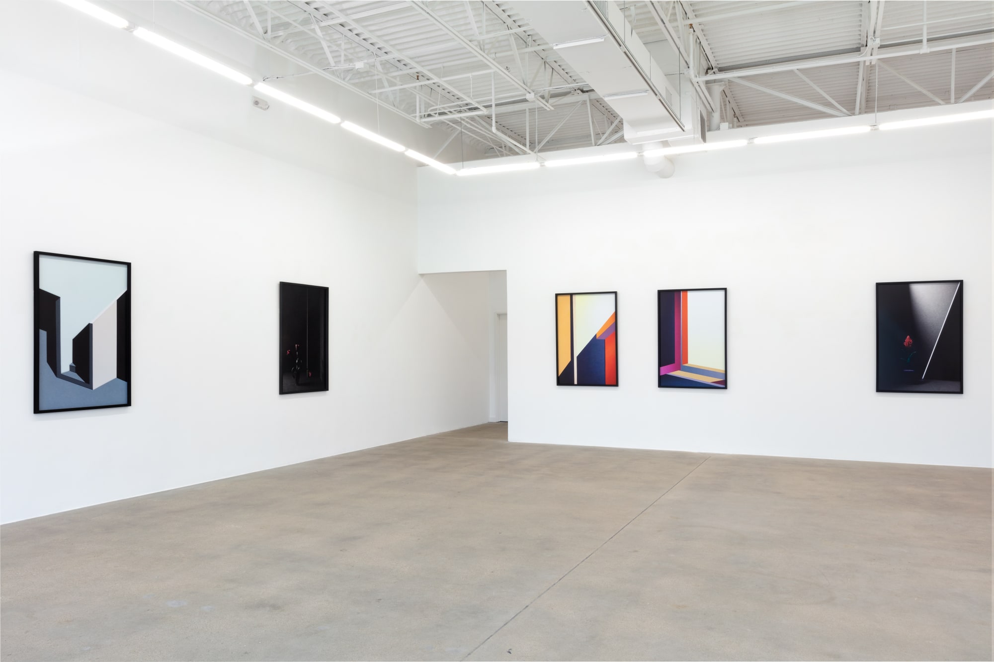 installation view of photographs by Popel Coumou