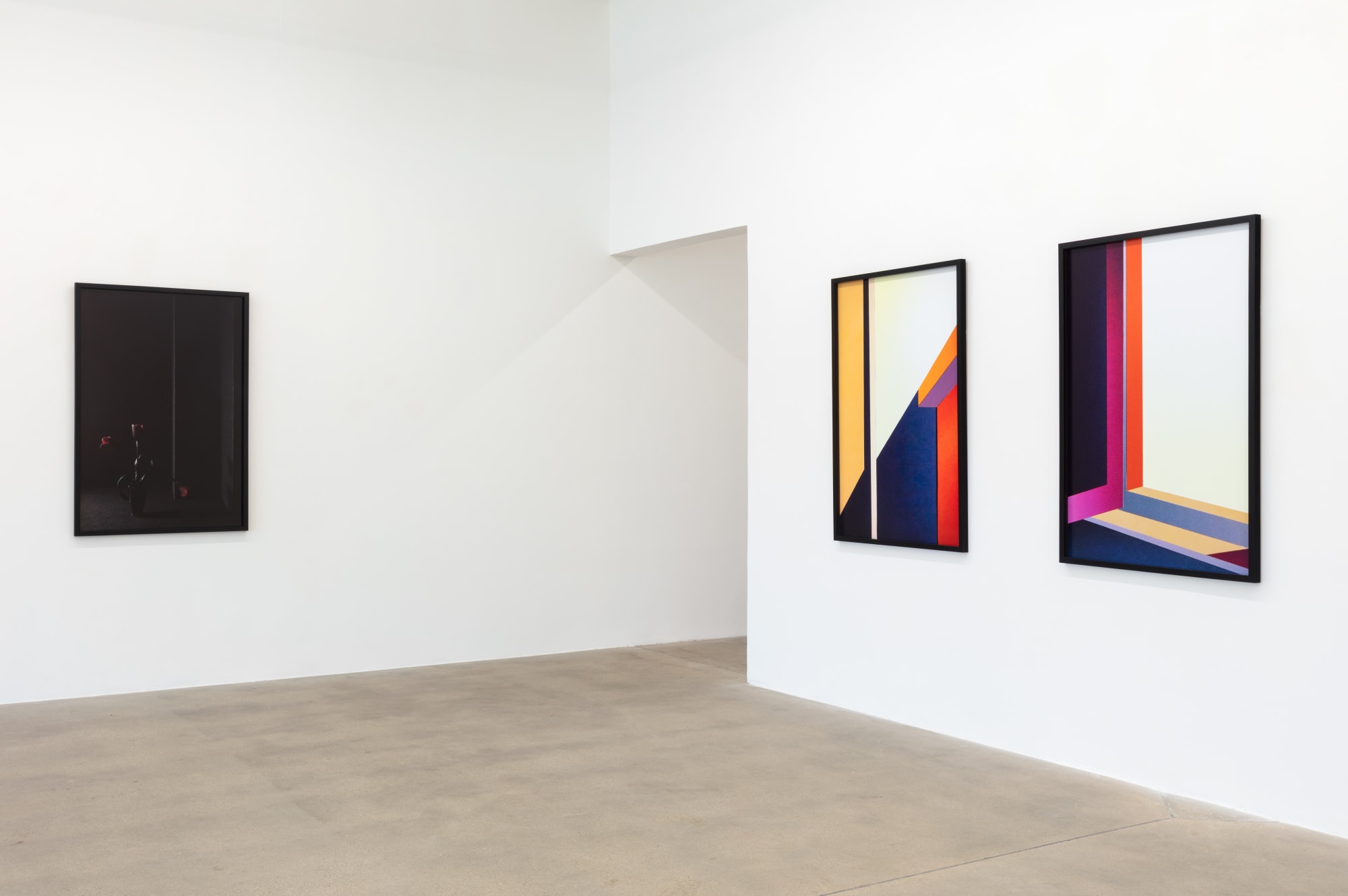installation view of photographs by Popel Coumou