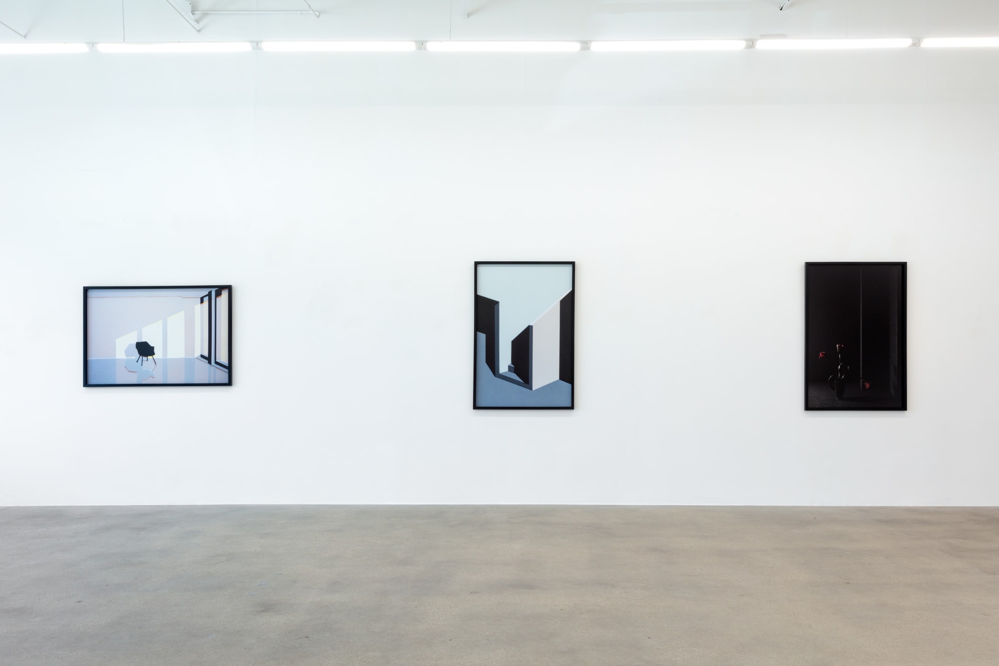 installation view of photographs by Popel Coumou