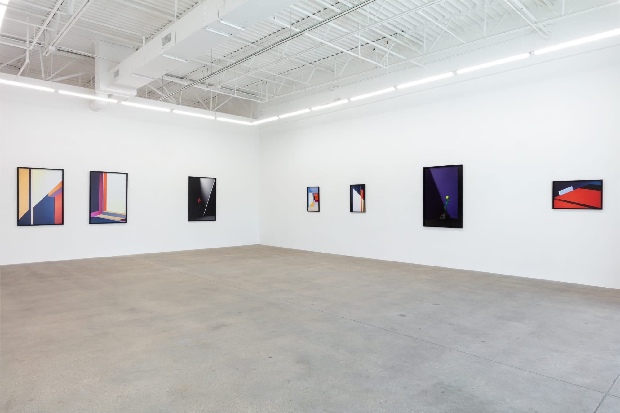 installation view of photographs by Popel Coumou