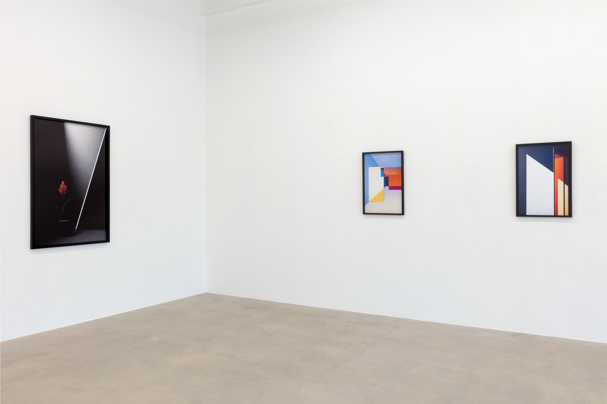 installation view of photographs by Popel Coumou