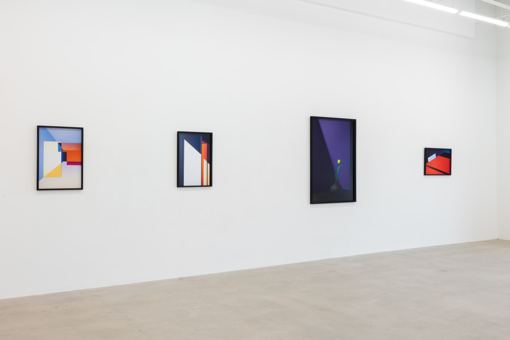 installation view of photographs by Popel Coumou