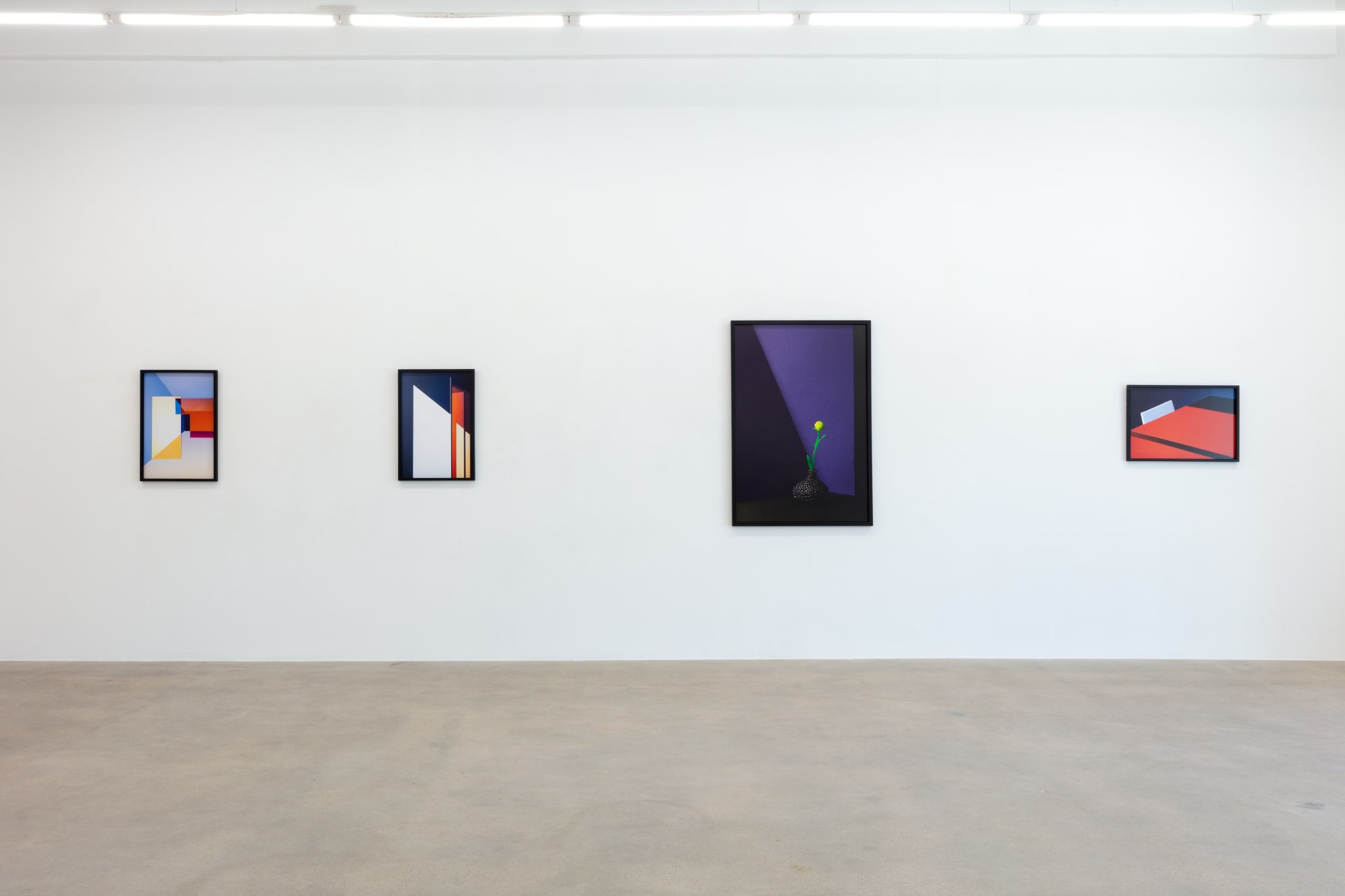 installation view of photographs by Popel Coumou