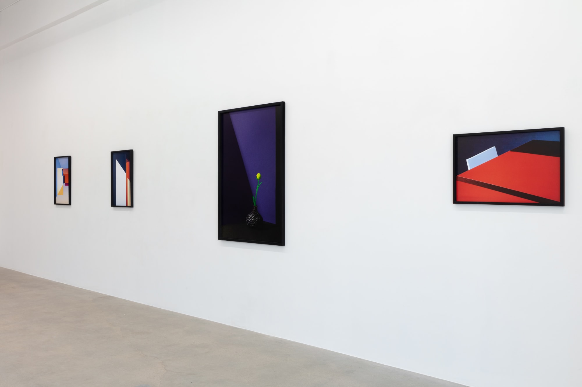 installation view of photographs by Popel Coumou