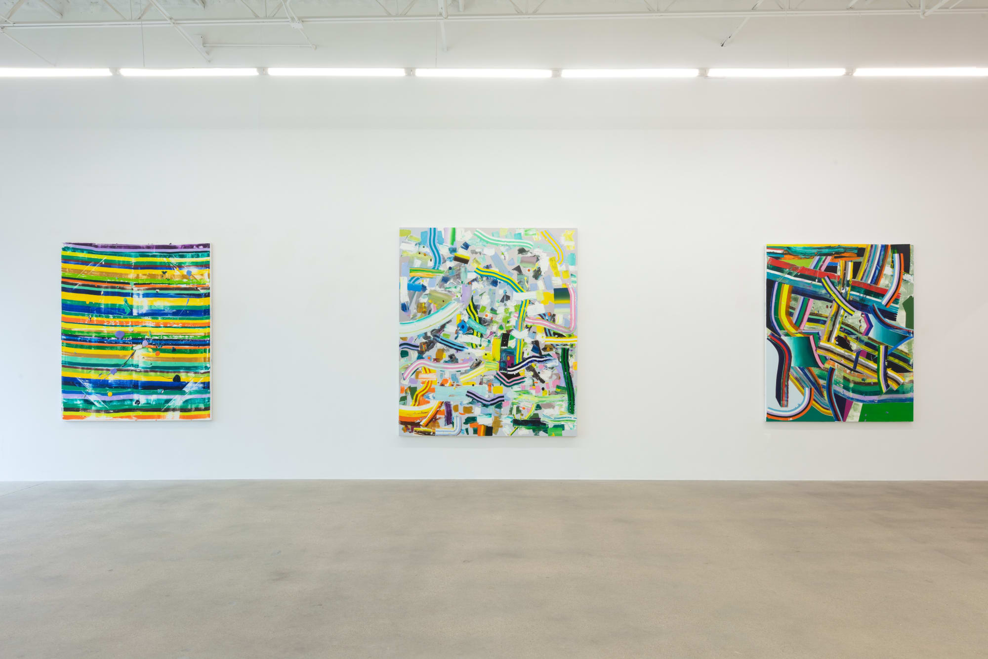installation view of abstract paintings by Eric Sall