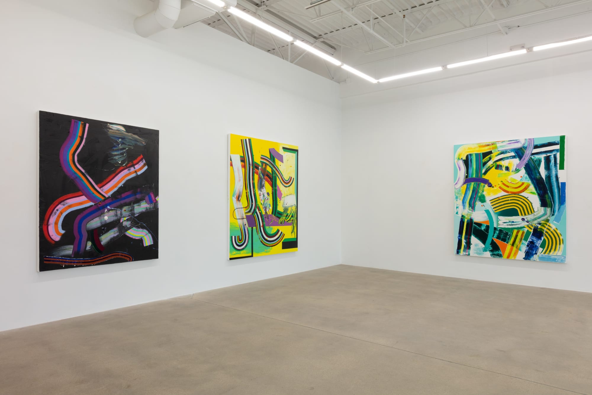 installation view of abstract paintings by Eric Sall