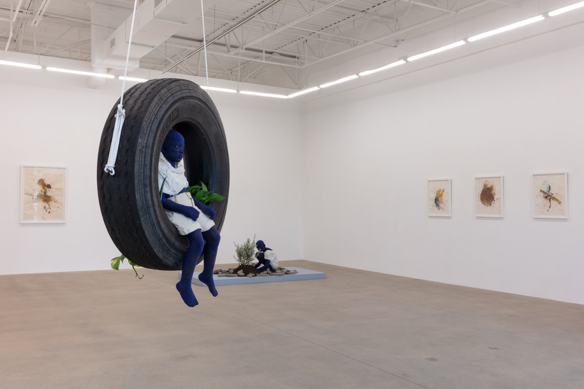 installation view of sculptures and works on paper by Beya Gille Gacha