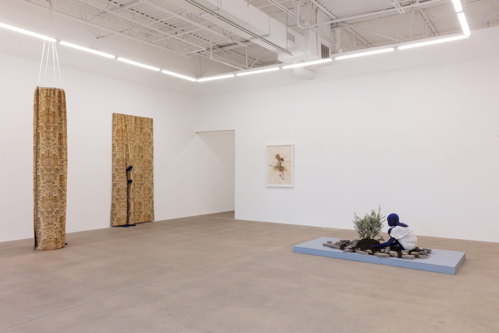 installation view of sculptures and works on paper by Beya Gille Gacha