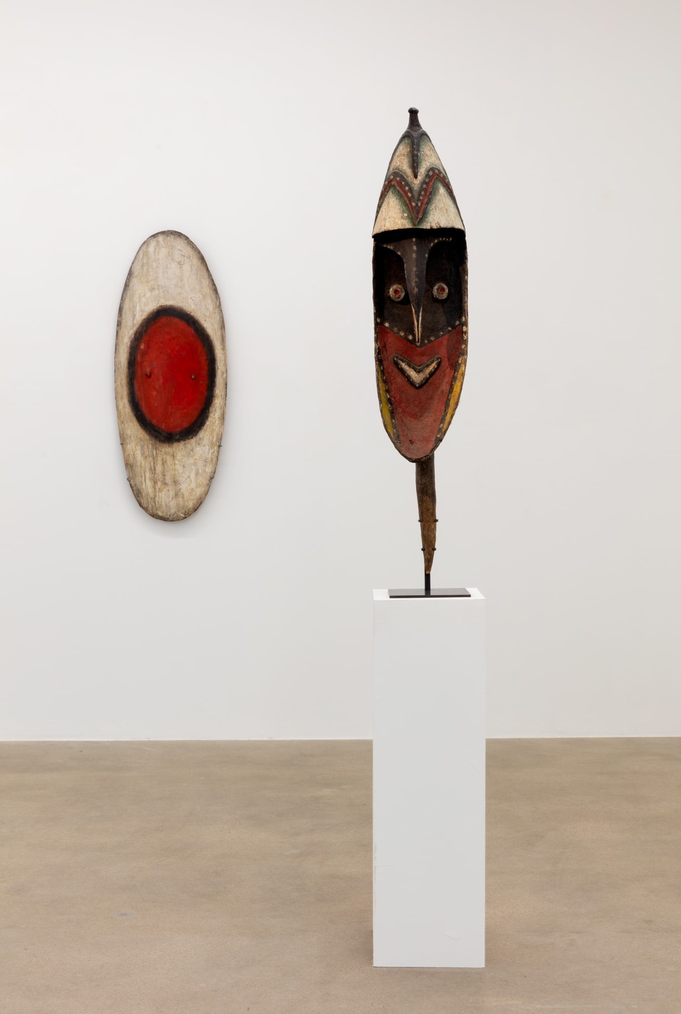 installation view of A Path Less Traveled, featuring historical ethnographic work and contemporary art