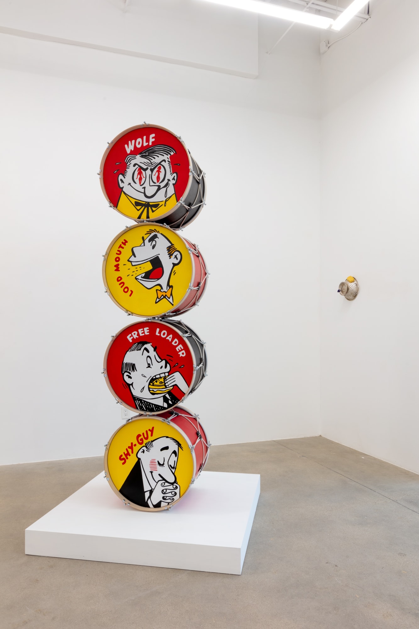 installation view of A Path Less Traveled, featuring historical ethnographic work and contemporary art