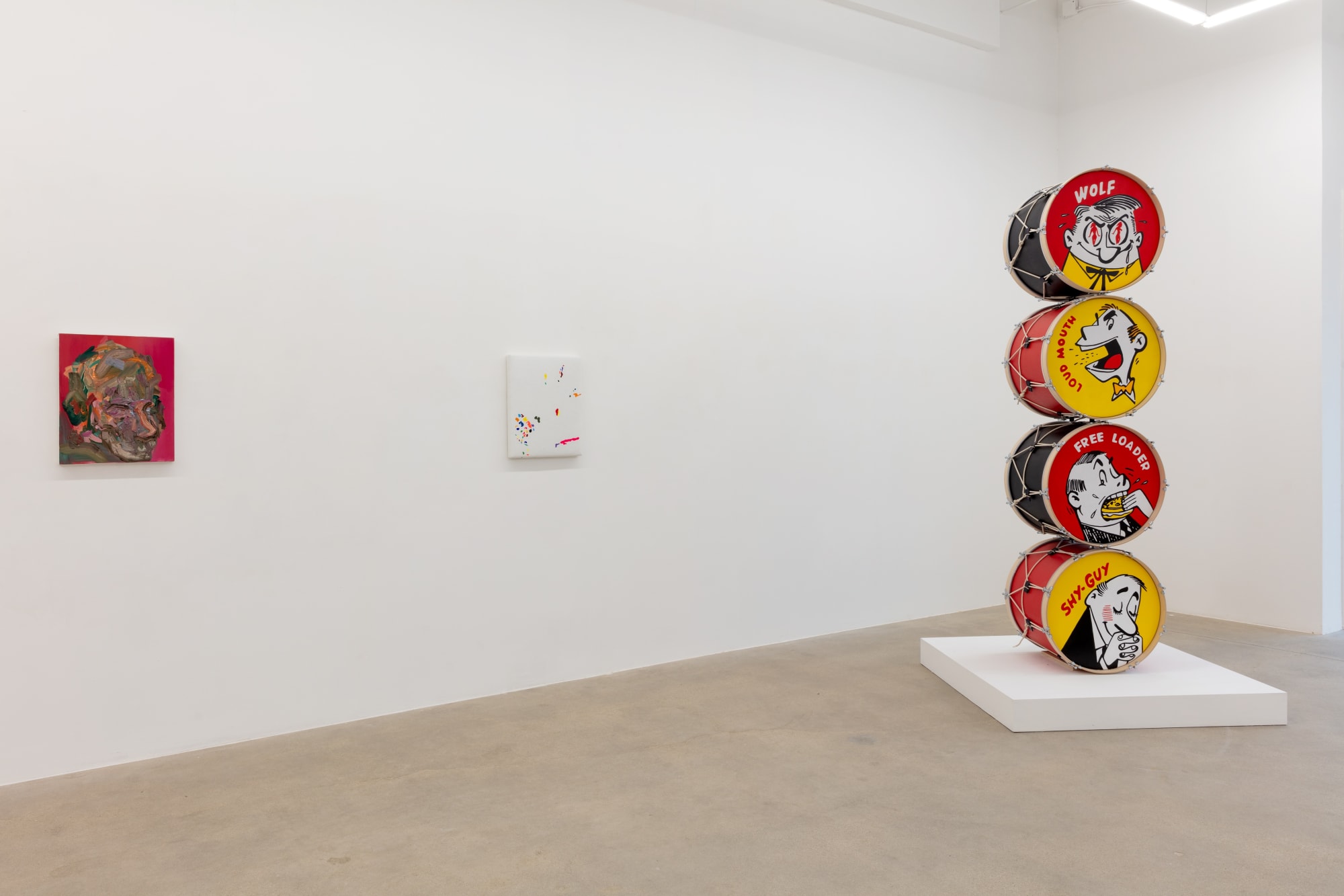 installation view of A Path Less Traveled, featuring historical ethnographic work and contemporary art