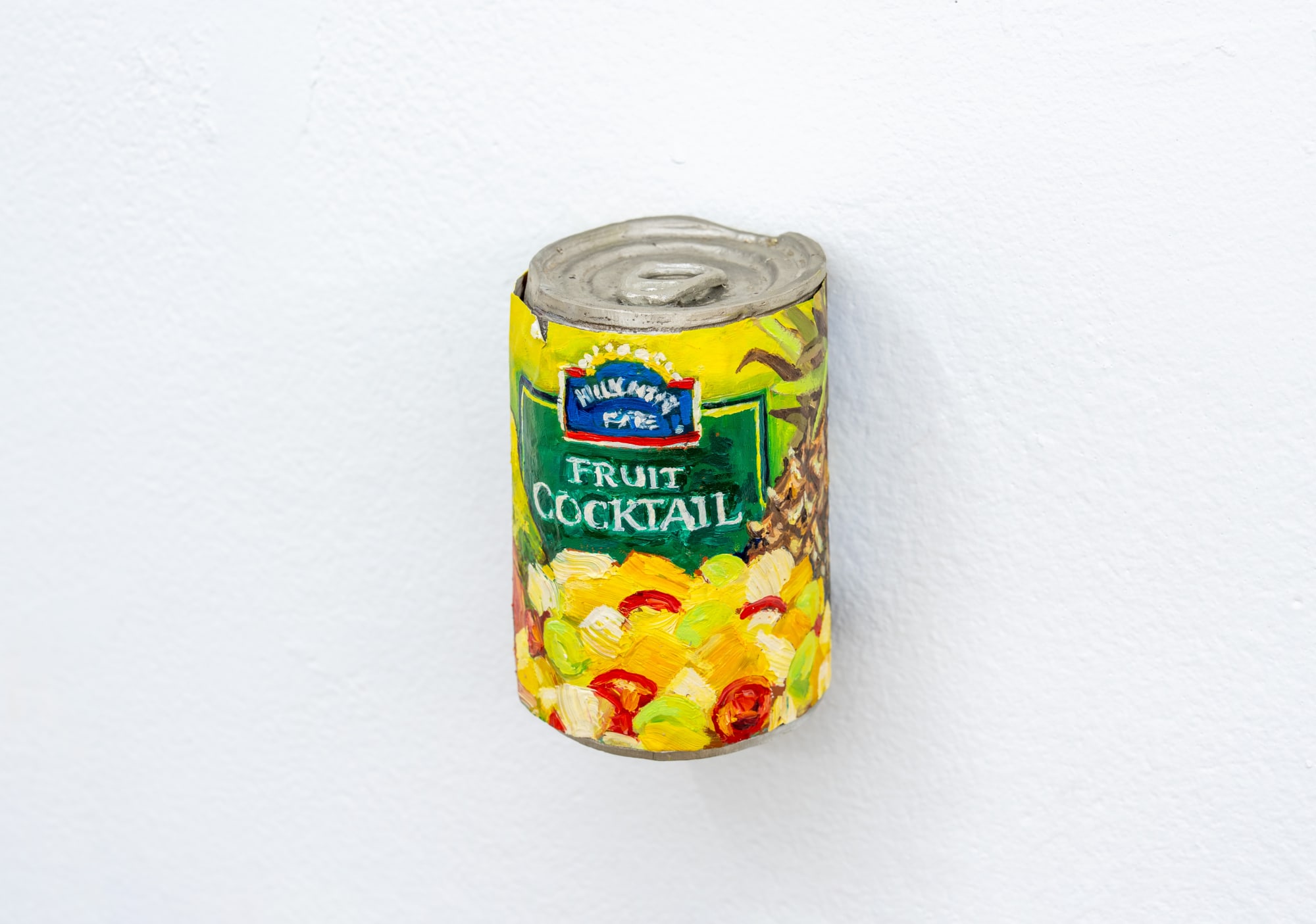 painted sculpture of can of fruit