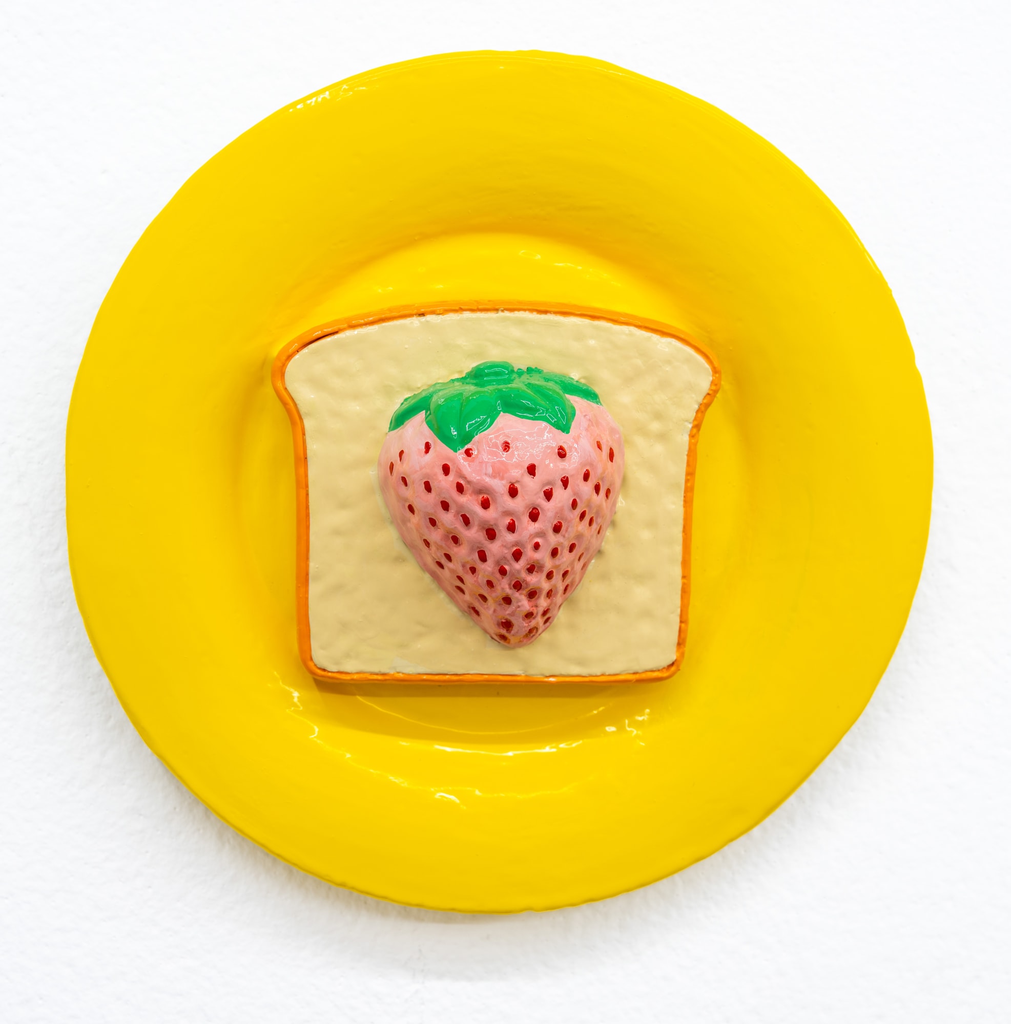 sculpture of bread and fruit on plate
