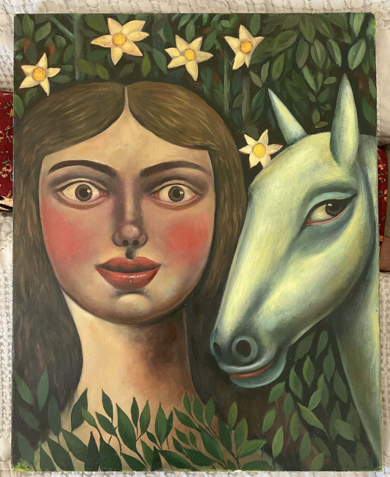 woman and horse placed in green plants