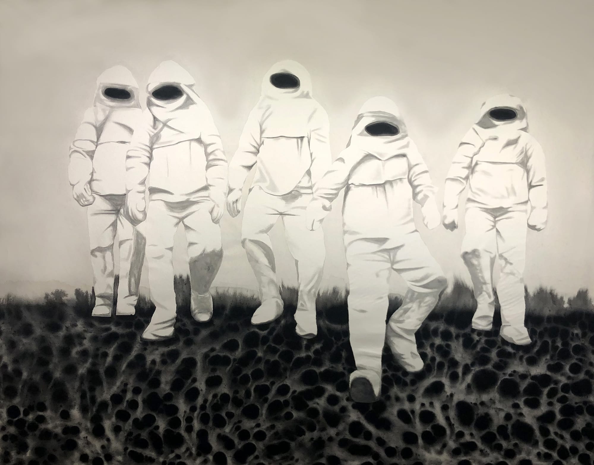 5 people in hazmat suit walking on lava like ground. Displayed in black, white and various greys.