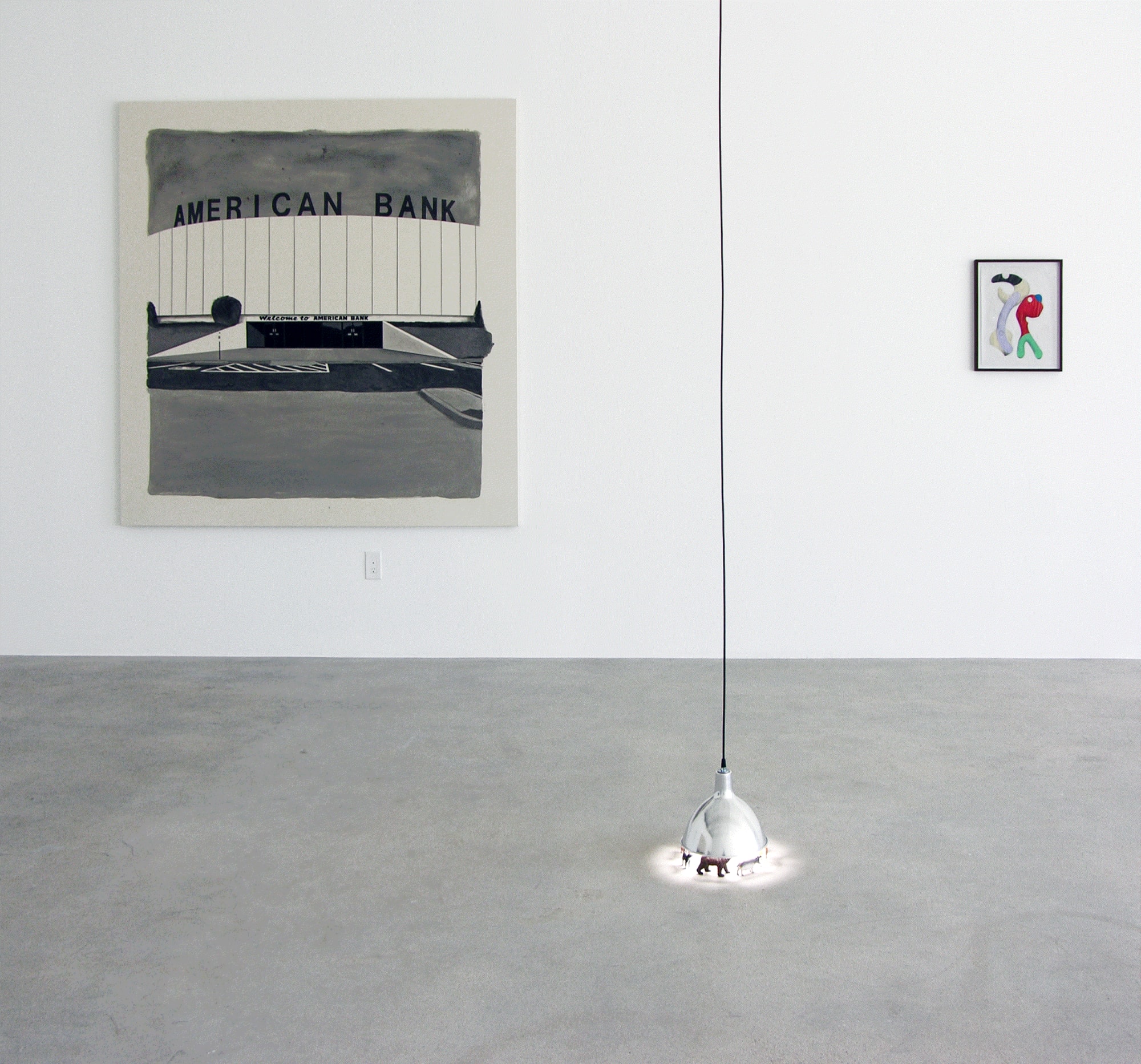 Installation view of Murmur, two works on the wall and a lamp sculpture on the front end.