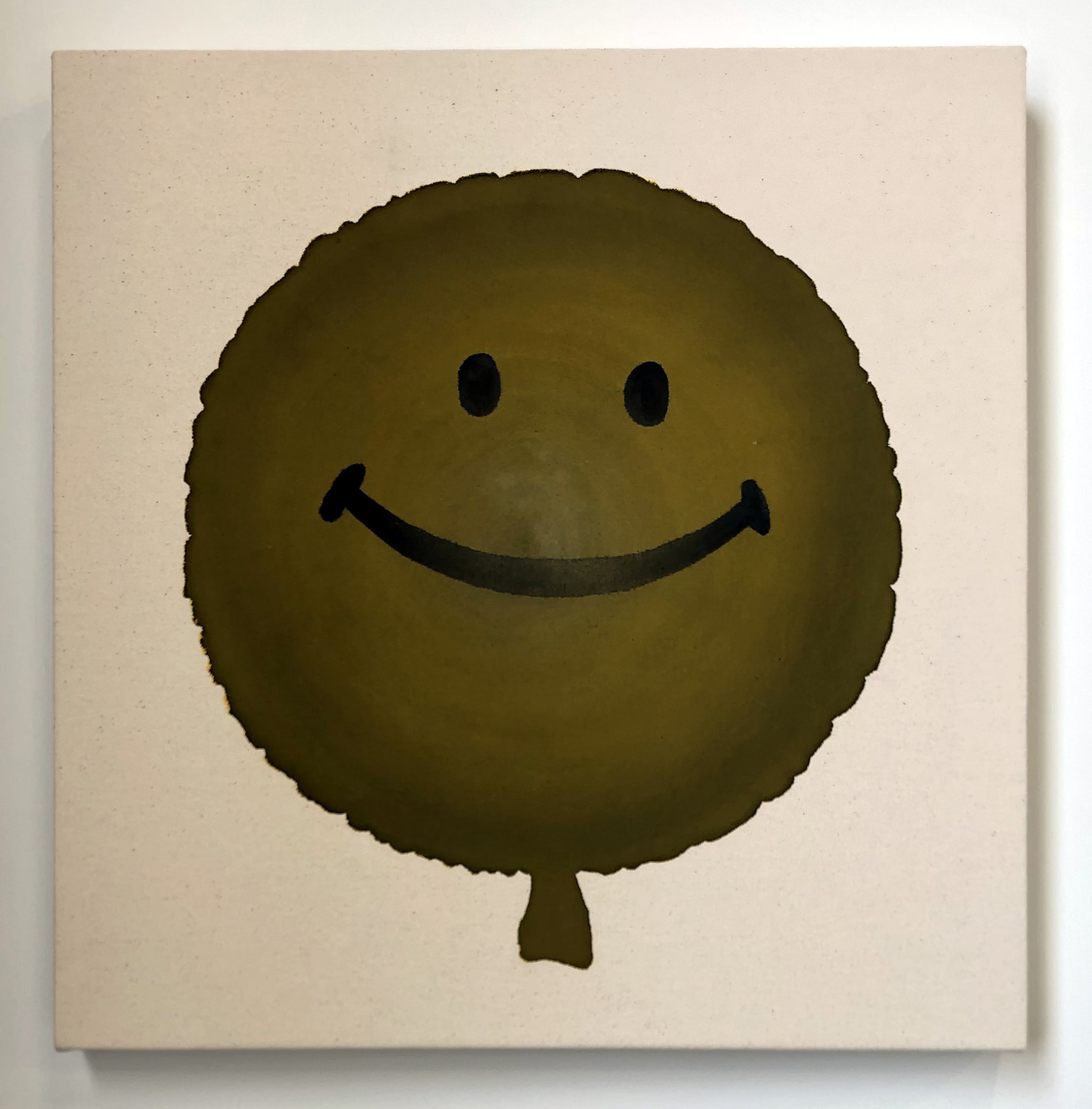 Smiley painted on balloon surface