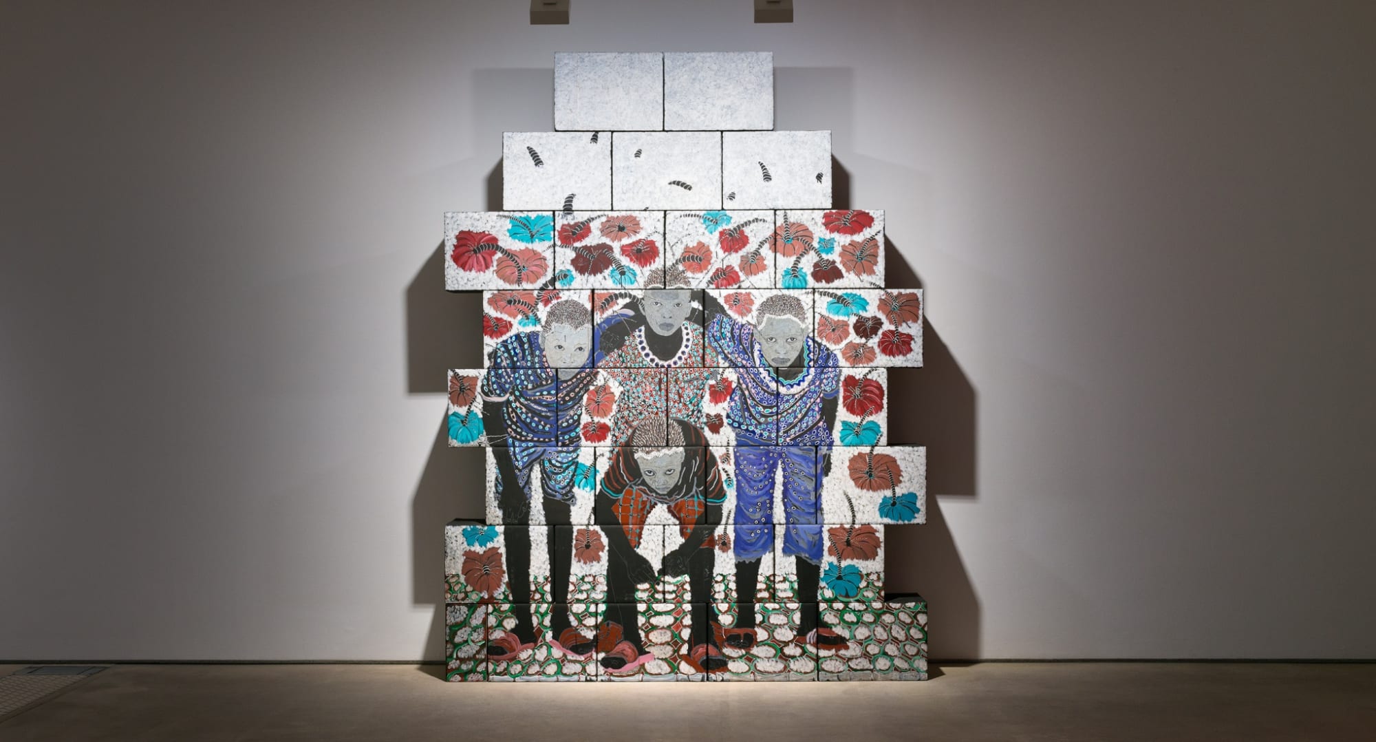 Omar Ba, Team, 2017, Oil, pencil, acrylic, ink, and gouache on corrugated card, As installed: 294.5 x 225.9 x 32.2 cm, 116 x 89 x 12 5/8 in
