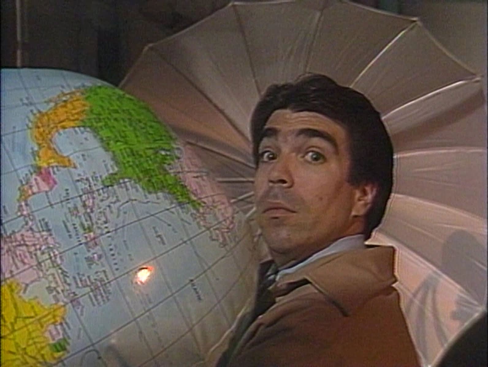 Still from Michael Smith and William Wegman, The World of Photography, 1986