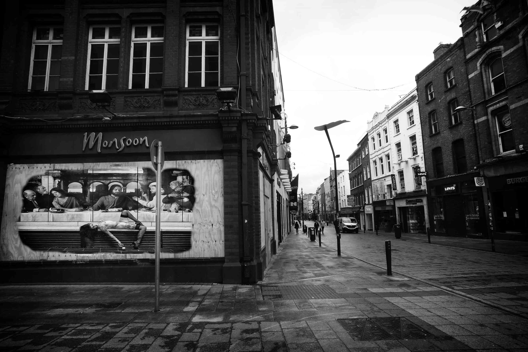 During the Covid - 19 First Lockdown in Dublin City, Ireland. A virtual image on an advertising billboard, in an empty city street. Images from Eamonn Farrell's The Naked City Virtual Exhibition for Dublin Culture Night 2020.