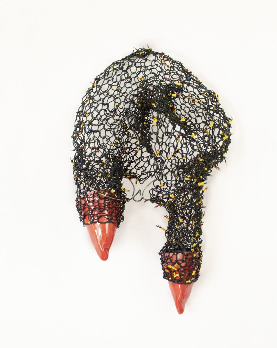 El Mal En Mi I / The Evil In Me I, 2018, Woven electrical wire, enameled ceramic, brass, 37” x 15” x 8"