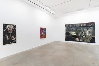 Installation shots of Coe's "Vigilante" and "One of the Cruelest Beasts Ever Known,"  in the exhibition "Group Show: Sue Coe, Eliza Douglas, Tschabalala Self, and Hyon Gyon," at the James Fuentes Gallery, New York, 2018
