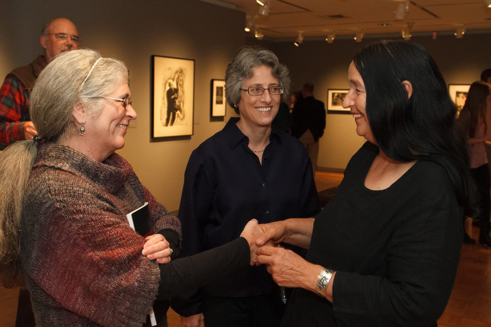 The artist and a fan at the opening of Coe's exhibition "Ghosts of Our Meat," at the Trout Gallery, Dickinson College, 2013–2014