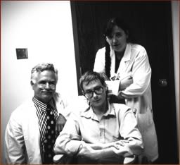 The artist and Dr. Eric Avery pose with one of the patients Coe immortalized in the AIDS Suite, Galveston, Texas, 1993