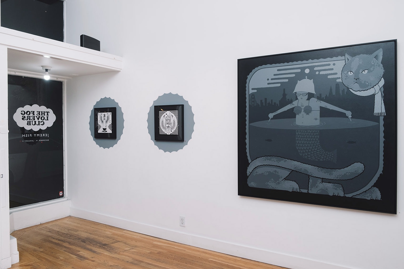 blue-grey toned Jeremy Fish work installed on a white wall