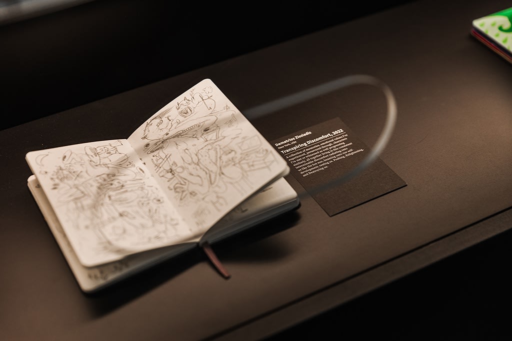 installation shot of notebook in case for The Moleskine Detour Exhibition