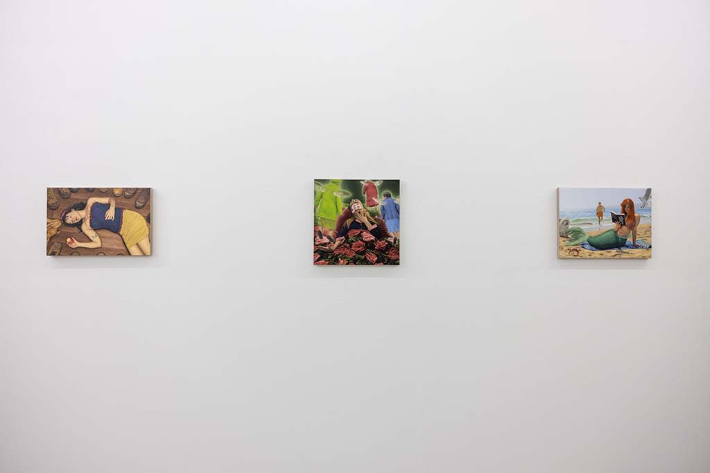 Photo of Matthew Grabelsky princess paintings hanging on white wall