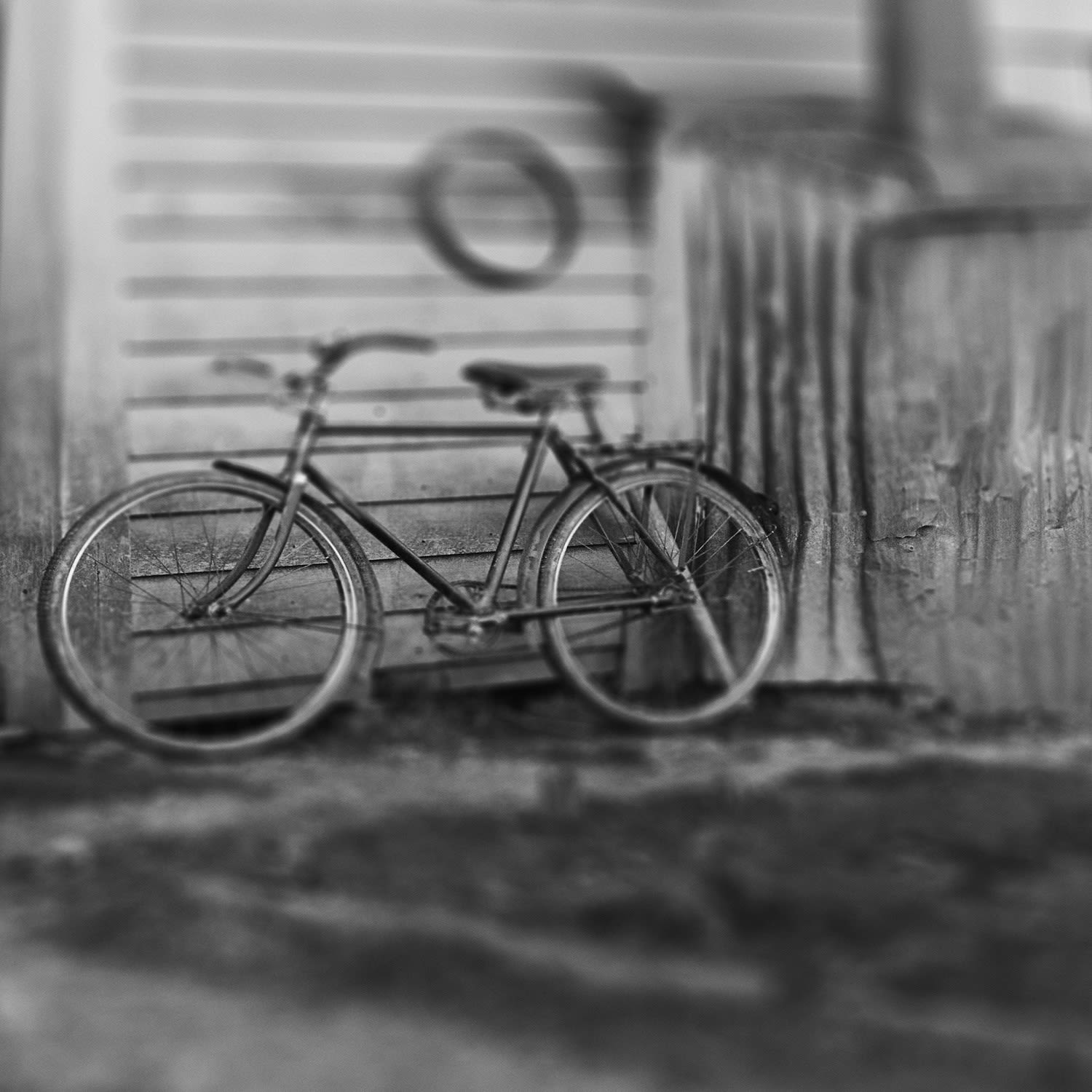 Detail from Joseph Divis’ photo of Jos Divis outside his cottage (Bicycle). Alexander Turnbull Library, New Zealand: 1/2-233064-G. 2020.