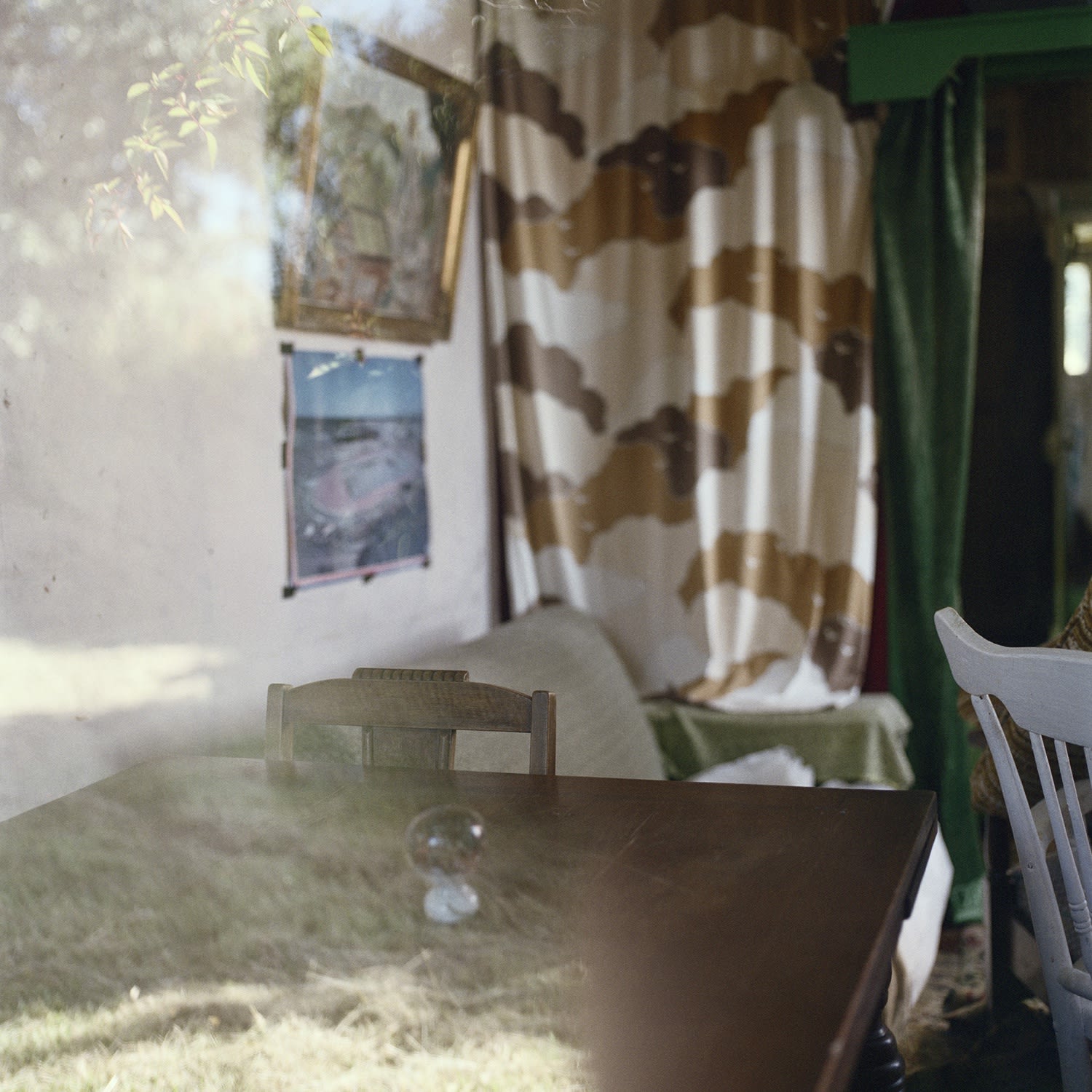Reflection in the window of former residence of Joseph Divis, photographer and miner (uninhabited), Waiuta, 2011.