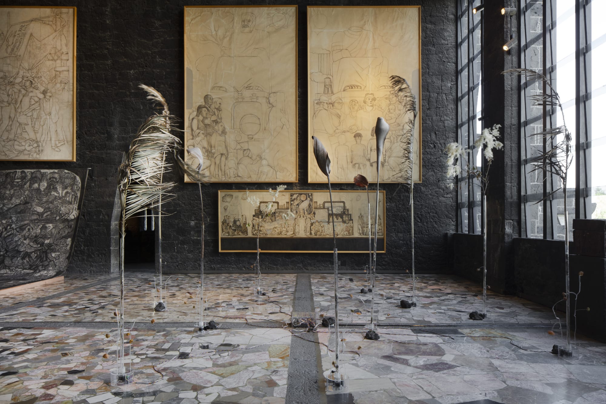 Carolina Fusilier Jardín biocósmico, 2025 Dry palm leaves, dry branches and flowers with assemblages of passion fruit shells with springs on acrylic tube. Ten rotating motors programmed to be animated in a 20 min sequence. Installation: 192 x 564 x 567 cm (75.5 x 222 x 223.2 in)