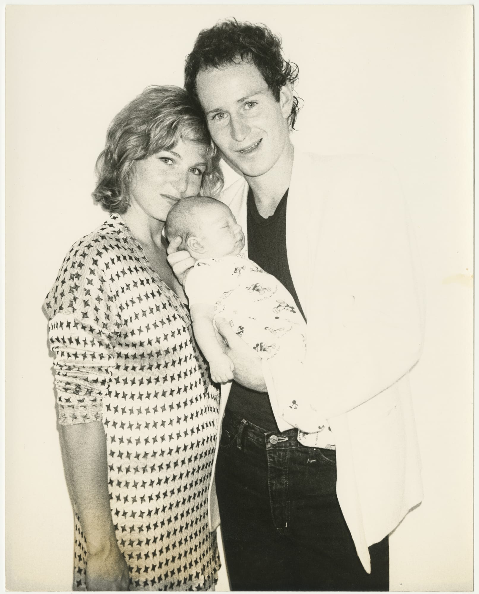 Andy Warhol Tatum O'Neal, John McEnroe and baby, 1986 Silver gelatin print 10 x 8 in 25.4 x 20.3 cm Framed: 18 x 16 x 1.25 in