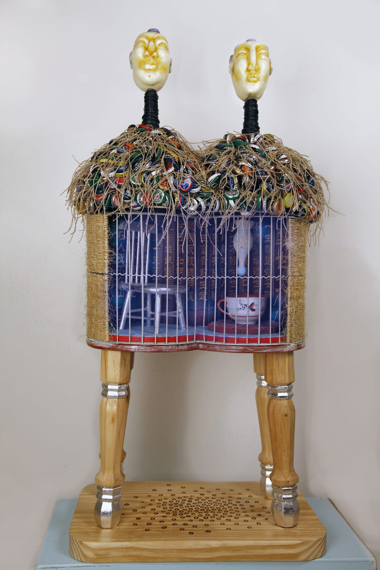 GRACE KISA WHEN THE ROOTS ARE DEEP THERE IS NO FEAR OF THE WIND MIXED RESIN METAL WOOD PAINT SISAL FIBER BOTTLE CAPS SILVER LEAF WIRE CERAMIC CUP LED LIGHTS 38 x 20 x 10 INCHES