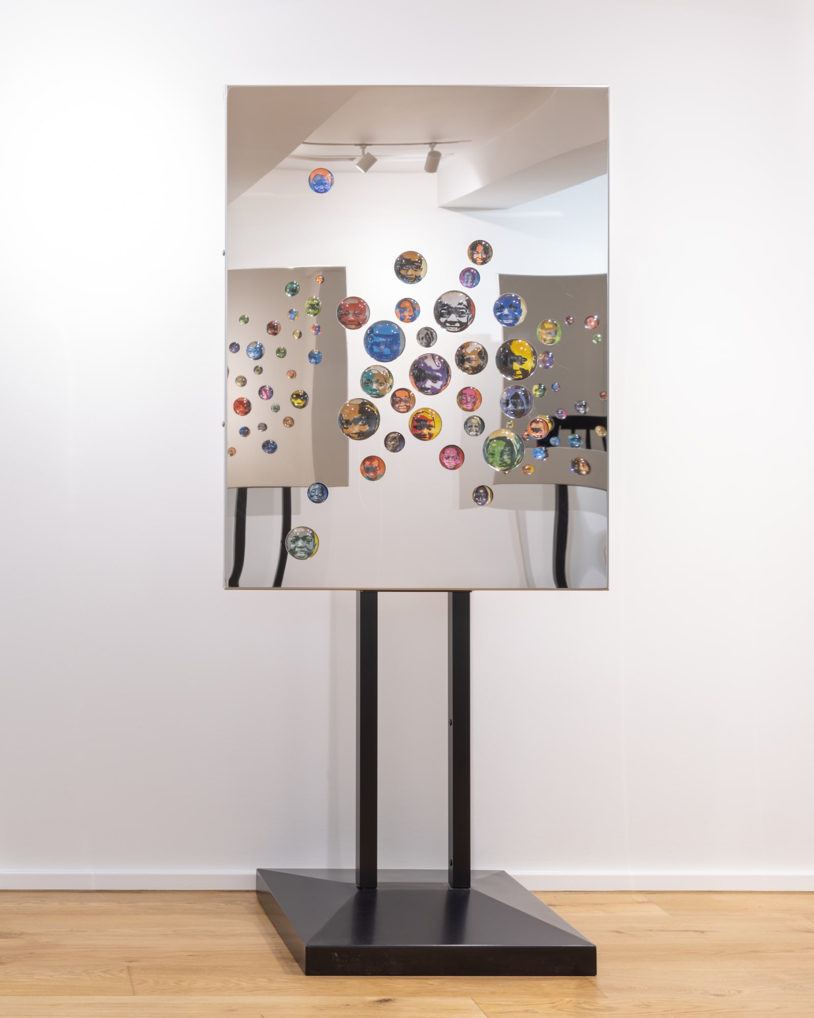 We came with the last rain (part 1) I Stainless steel, magnifying glass, acrylic paint on canvas, aluminium and mild-steel stand 482 x 36 x 3.2 Inches 2023