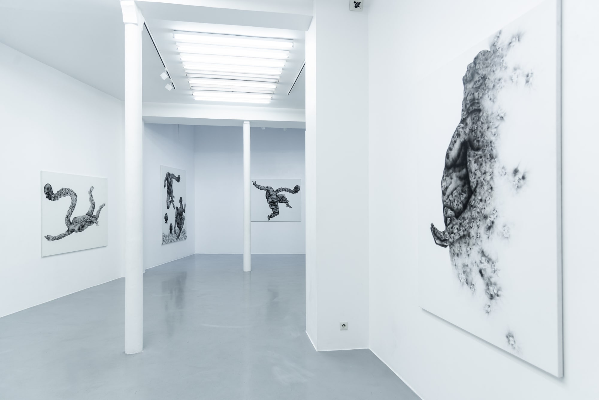 View of Géraldine Tobe's smoke on canvas works at AFIKARIS Gallery in Paris. Contemporary art from Congo, Kinshasa