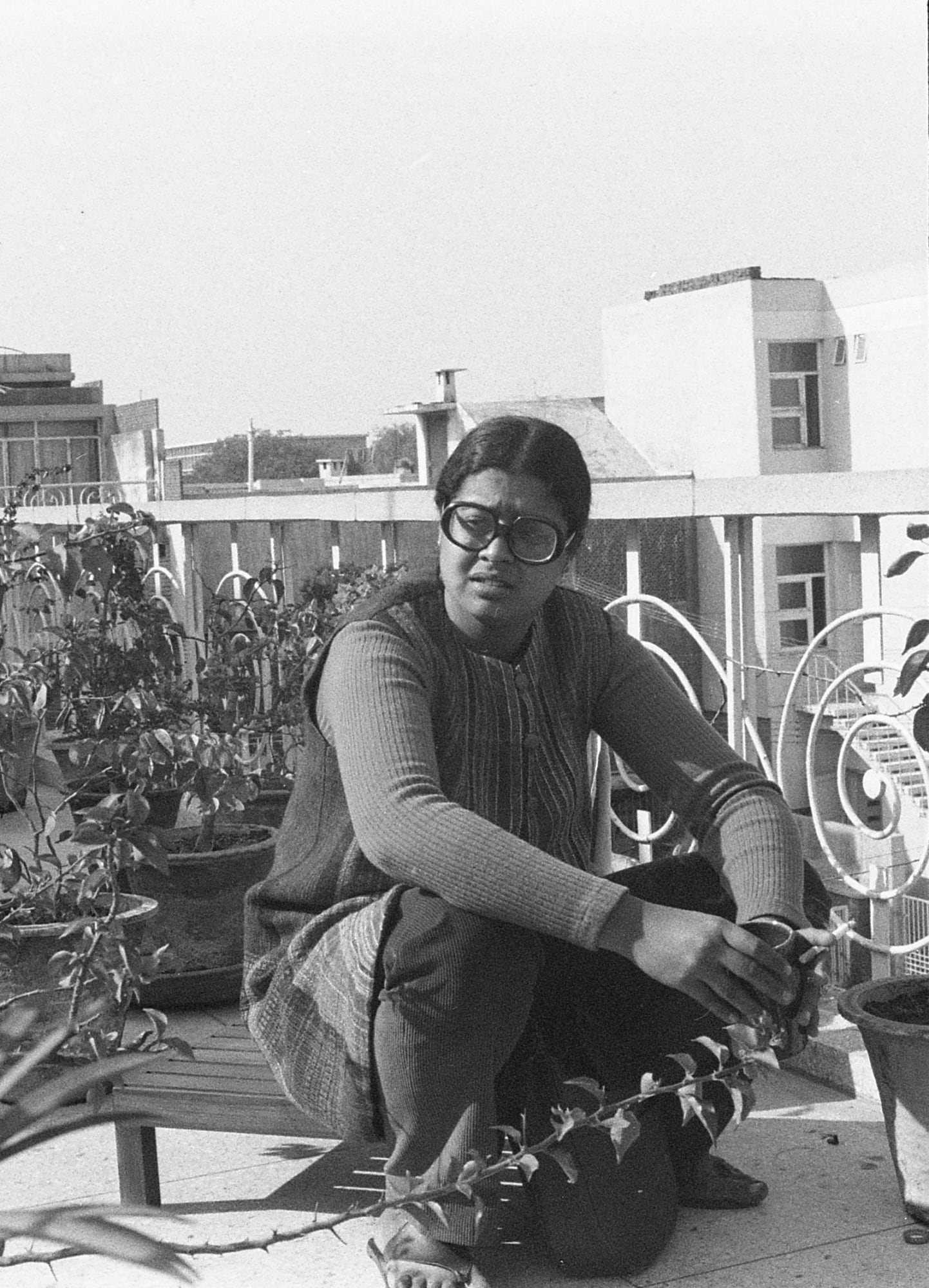 A young 'Dillu' as Mrinalini Mukherjee was affectionately called by friends and family, captured in her early twenties seating in her newly rented barsati and on the cusp of an artistic journey that would span decades.