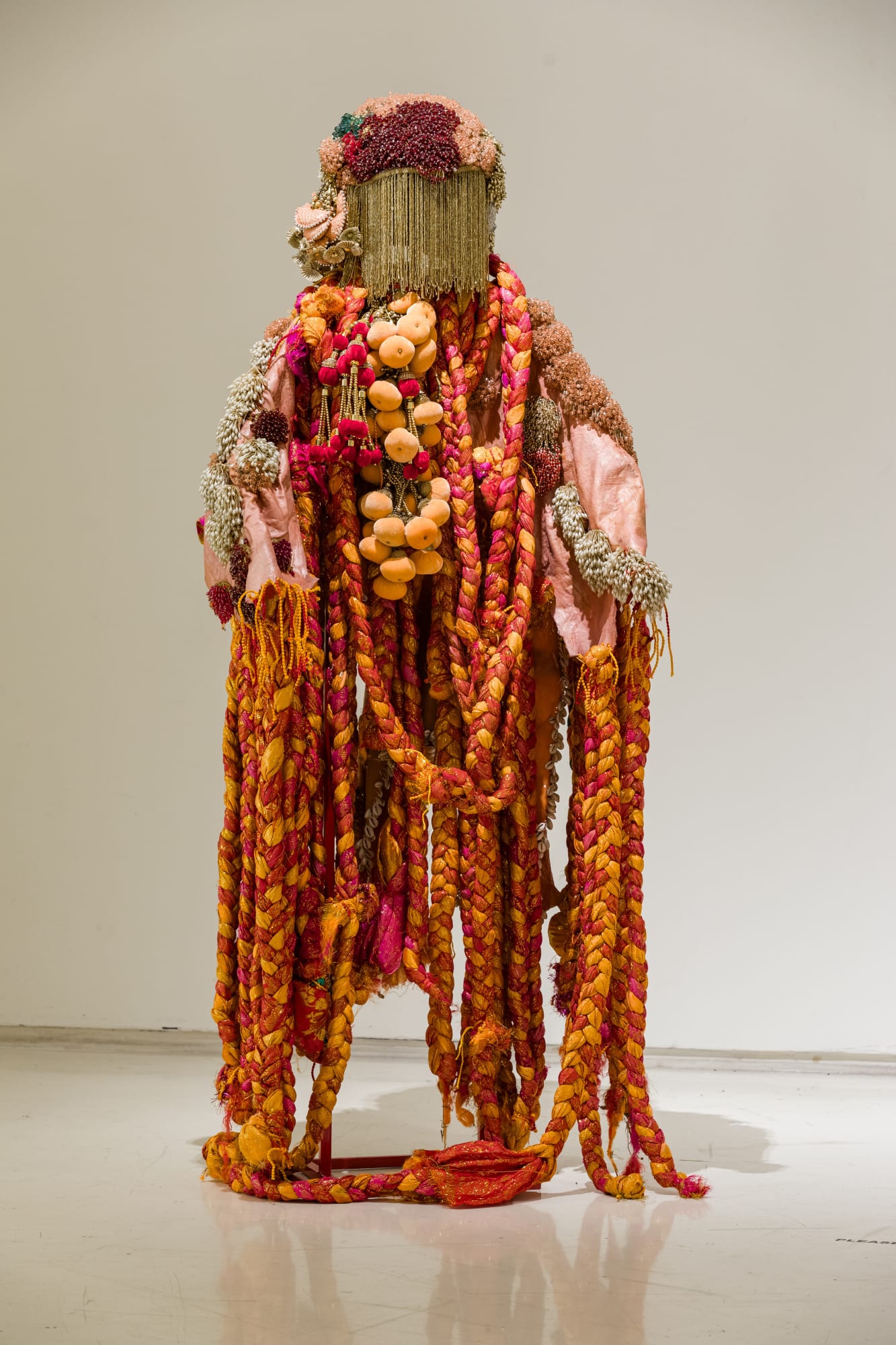 Debashish Paul (b.1994) The Skin of Dreams 1 Latex rubber, plastic and crystal beads, cotton, threads, cowries shell, fabric, and plastic helmet 75.1 x 31.8 x 19.2 in. 2024, Varanasi