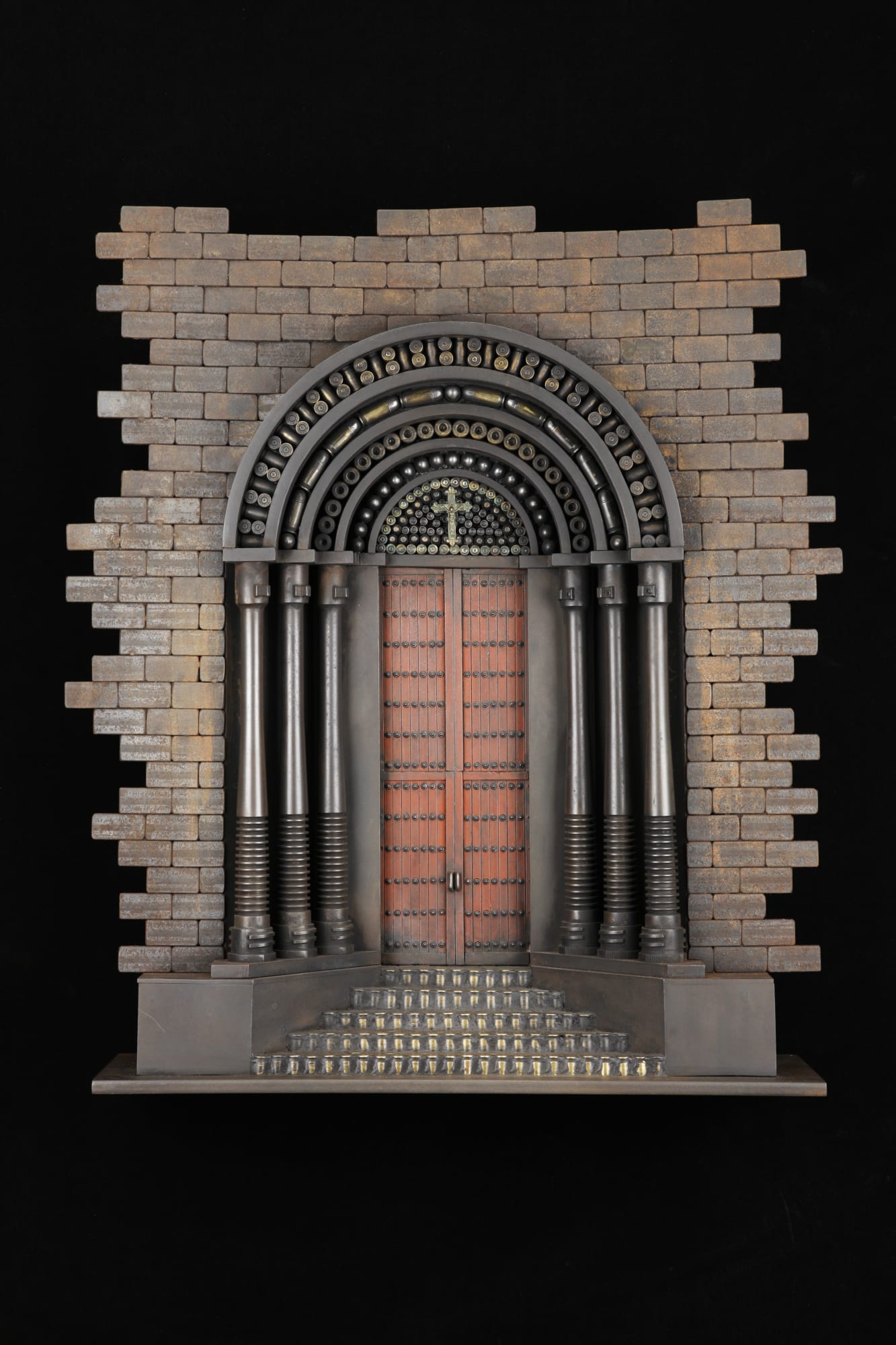 Red Door, 2014 Gun barrels, bullets, cartridge shells, steel, crucifix 24 1/2 x 22 x 6 inches $35,000