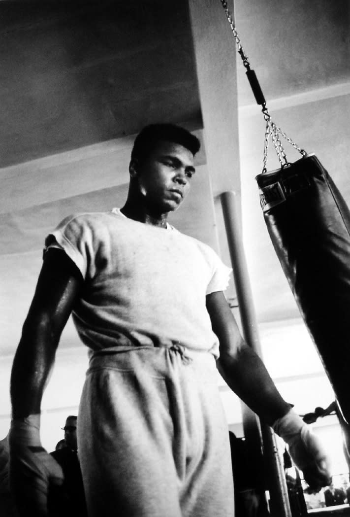 Flip Schulke Ali training with boxing bag, Fifth Street Gym, 1964 Signed in pencil on verso Print Date: 2006 Silver gelatin print Paper Size: 40 x 50 cm
