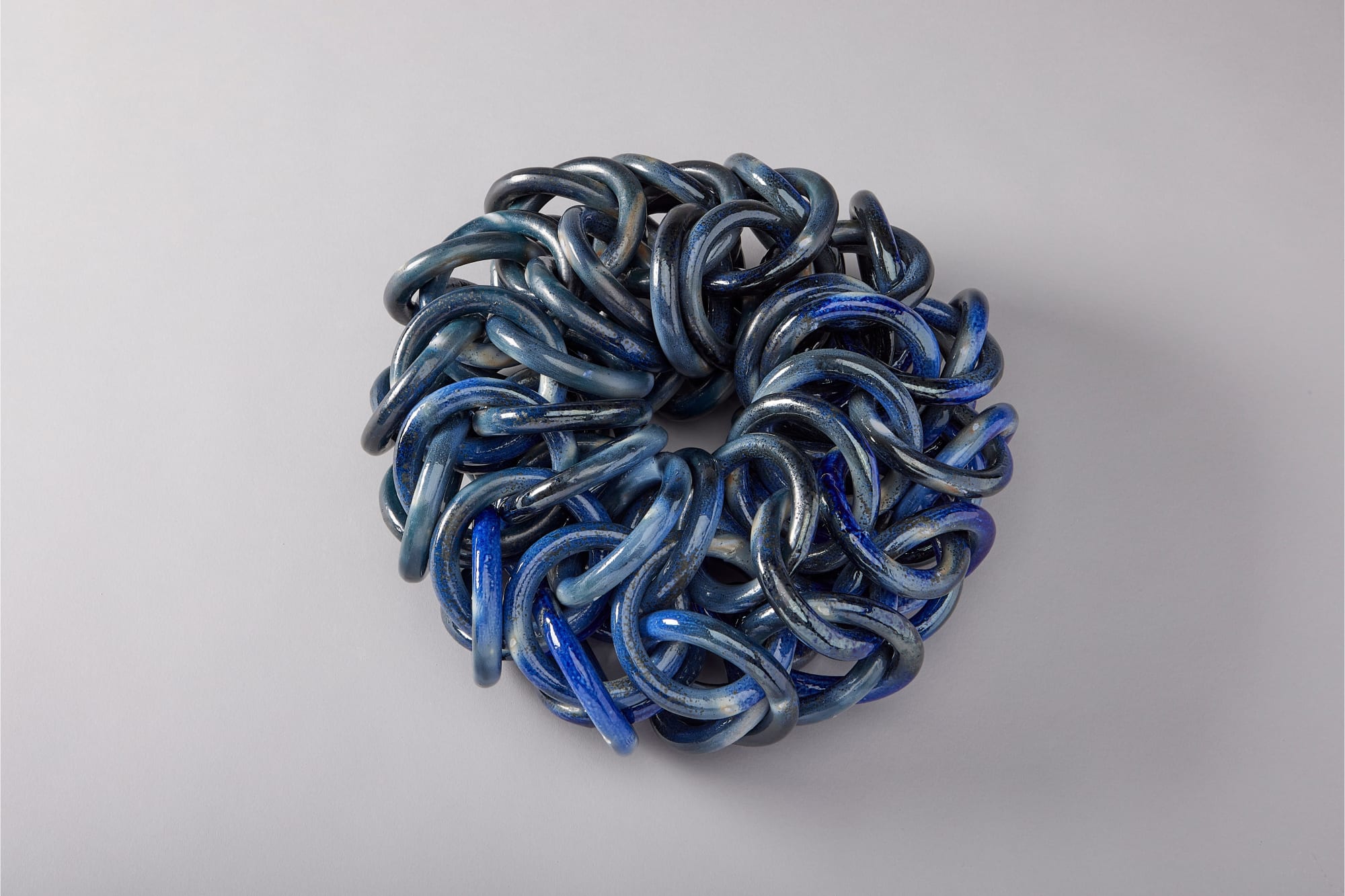 Ruth Borgenicht, Cobalt Centipede wood-salt fired.jpg, 2024