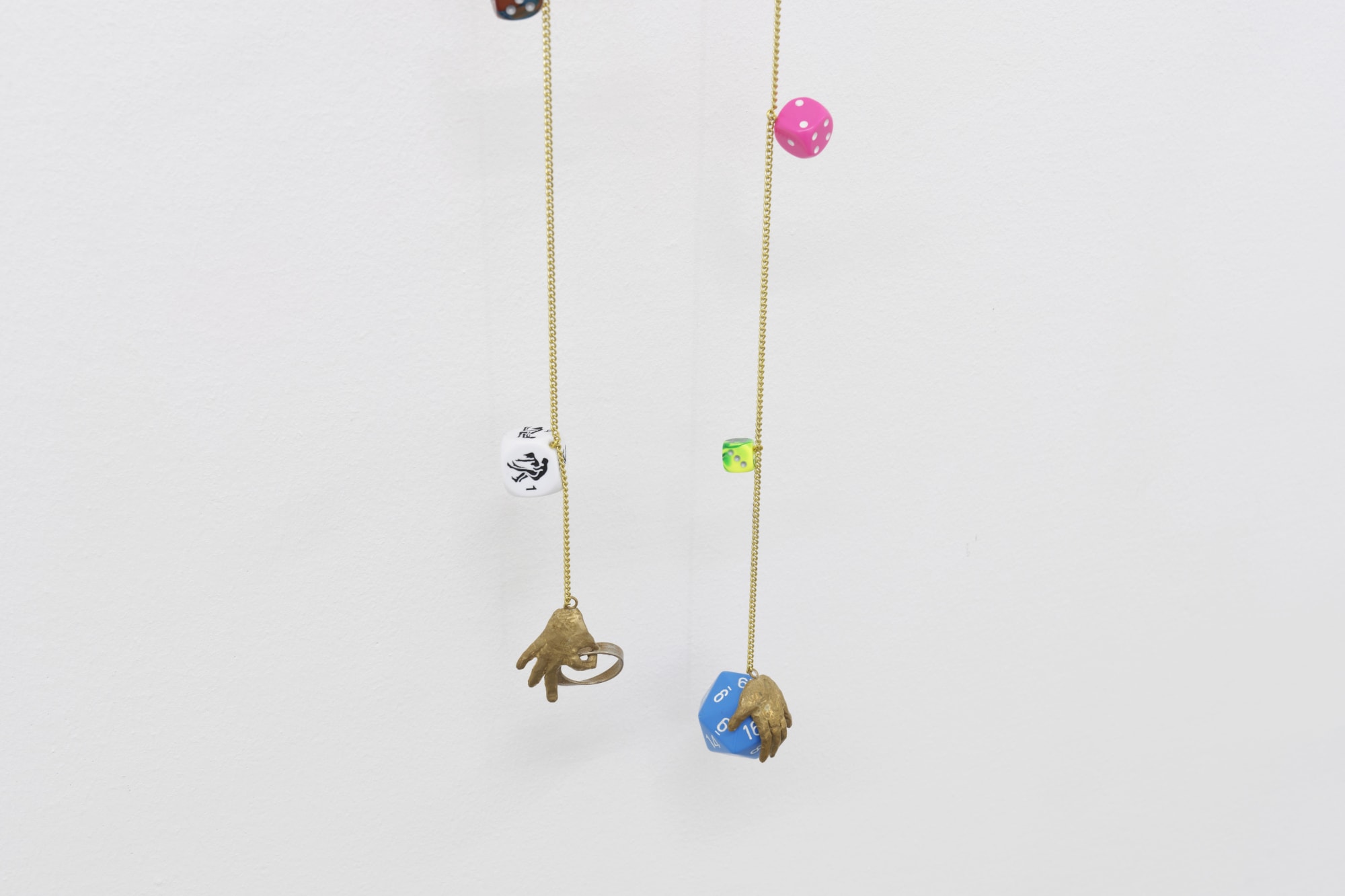 Detail, Cassidy Toner, Hindsight is 20/20 #3, 2020-2021, car mirror, dice, brass and chain, 160 x 24 x 6 cm