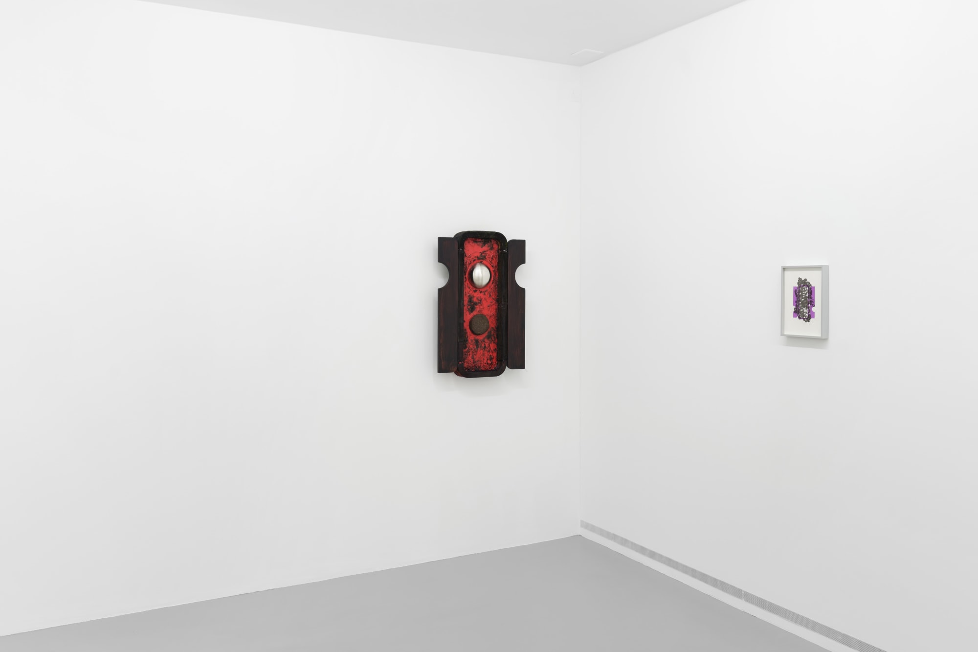 Left, Bridges (red), 2020, beeswax, textile debris, soil, iron, acrylic on wood, 100 x 53 x 9.5 cm (open)