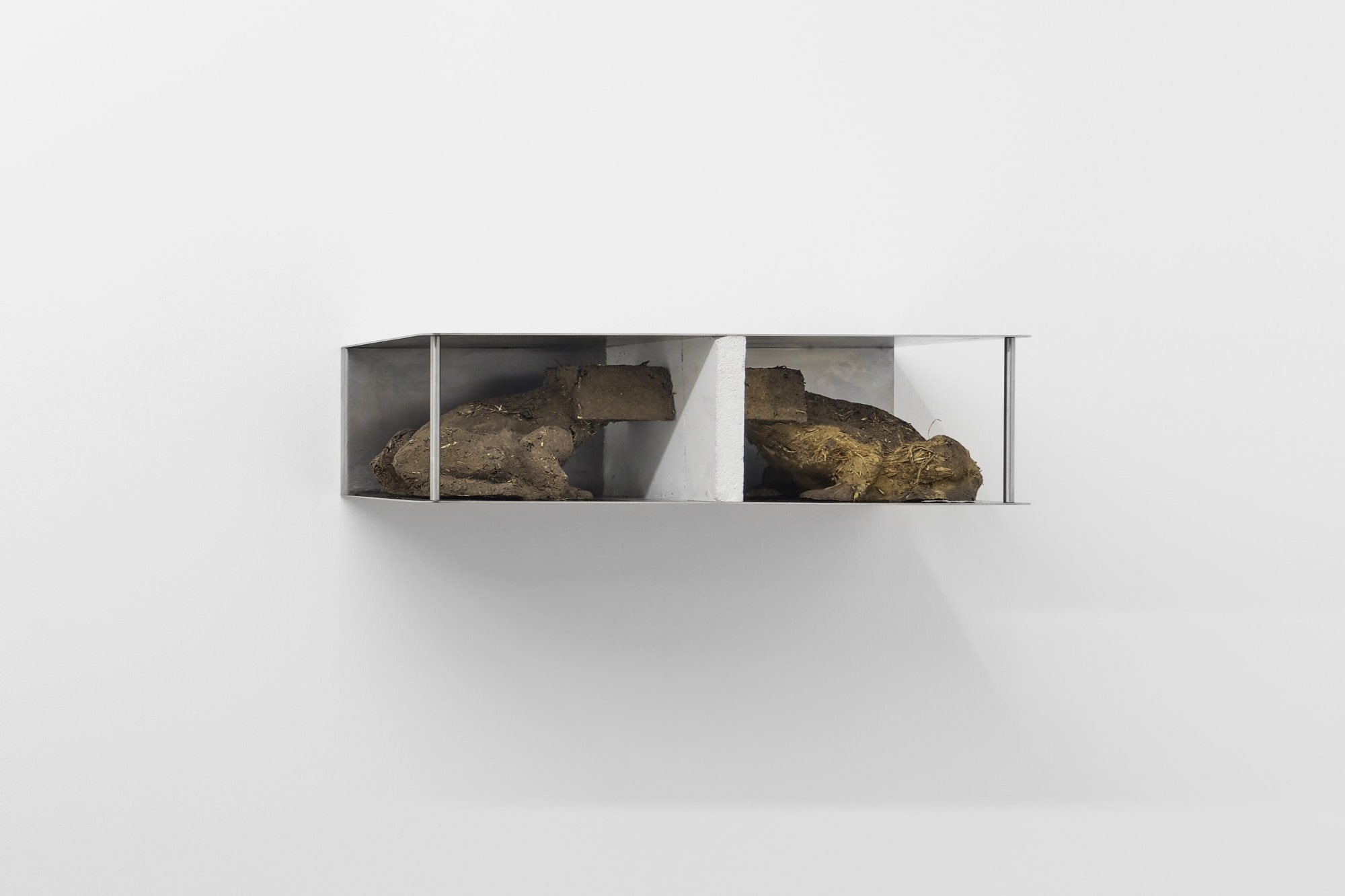 Birds are Books, 2020, chrome steel, clay, humus, hay, acrylic binder, 17.5 x 63 x 32 cm, Ed. of 3