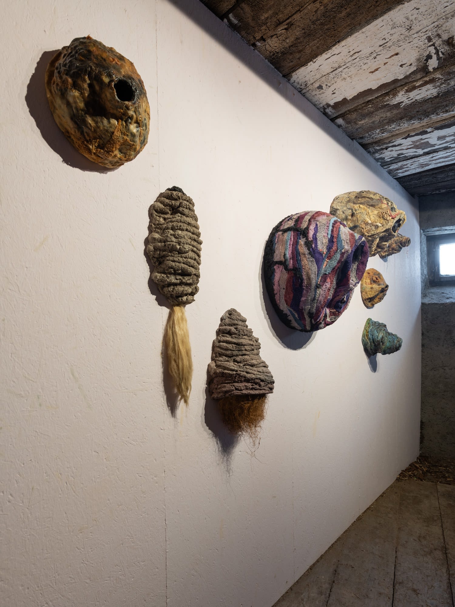 Installation view of eight works, Untitled (Nest), 2017-19, mixed media, dimensions variable