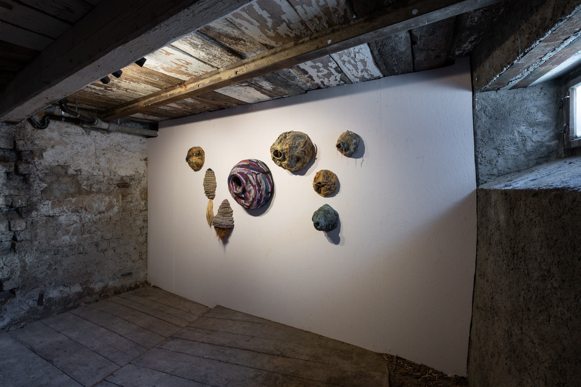 Installation view of eight works, Untitled (Nest), 2017-19, mixed media, dimensions variable