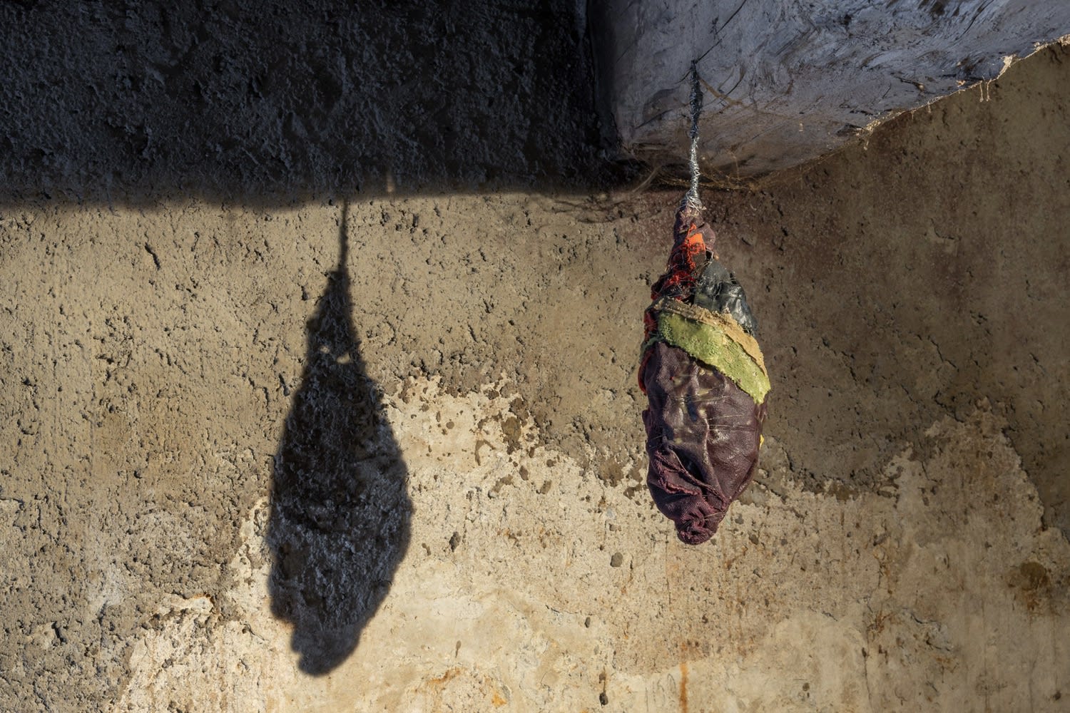 Untitled (Cocoon), 2018, fabric, wire, wax, 25 x 8 x 8 cm